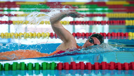 Elite-female-swimmer-during-a-front-crawl-swimming-training,-slow-motion-shot