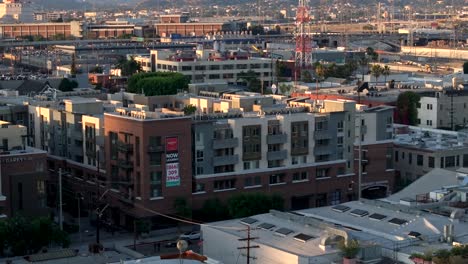 The-industrial-district-of-East-Los-Angeles,-California---ascending-aerial-reveal