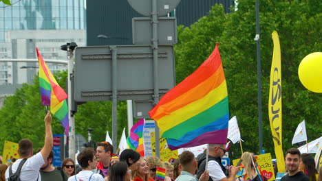 Crowd-Of-Protesters-With-Rainbow-Flags-And-Banners-At-Freedom-March-On-The-Street-Of-Warsaw-In-Poland