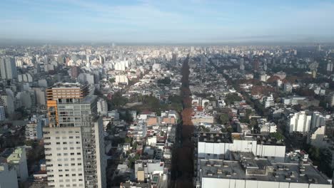 Drone-flies-over-the-streets-of-Palermo,-revealing-Armenia-Street-and-the-Esmeralda-building-on-Guatemala-Street-in-Buenos-Aires