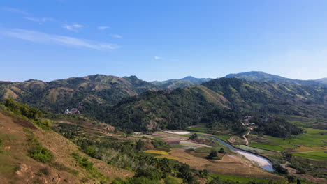 Scenery-Of-Mountainscape-With-Terraced-Fields-And-River-Near-Pantai-Watu-Bella,-West-Sumba,-East-Nusa-Tenggara,-Indonesia