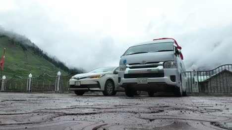 Vehicle-camping-in-the-high-mountains-during-the-summer-time-with-the-clouds-in-the-Background-in-Pakistan