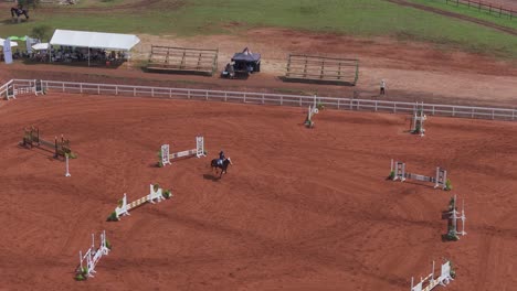 Aerial-View-of-Thrilling-Horse-Jumping-Event