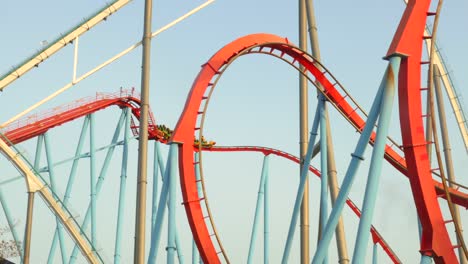 Extreme-Rides-Of-Dragon-Khan-Roller-Coaster-In-China-Area-At-Port-Aventura-Amusement-Park-In-Salou,-Spain