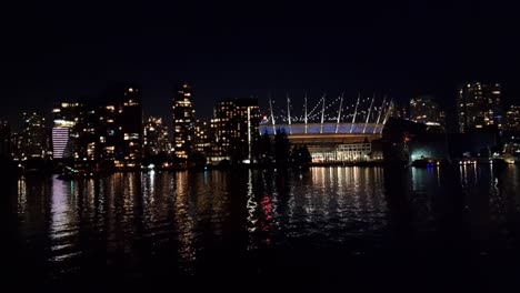 Vista-Nocturna-Del-Estadio-De-China-Y-Los-Rascacielos-Que-Lo-Rodean-Durante-La-Noche-En-Vancouver,-Columbia-Británica,-Canadá