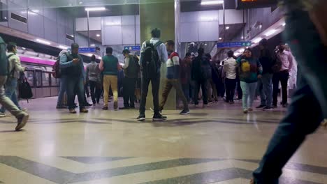 metro-station-view-with-metro-arriving-and-passenger-walking-from-different-angle-video-is-taken-at-janakpuri-west-delhi-india-Jan-04-2023