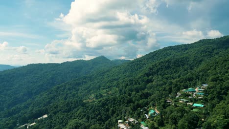 4K-Cinematic-nature-aerial-drone-footage-of-the-beautiful-mountains-of-Doi-Pui-next-to-Chiang-Mai,-Thailand-on-a-sunny-day