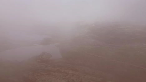 A-timelapse-video-capturing-the-highest-point-of-Serra-de-Estrela-in-Portugal,-showcasing-the-dynamic-movement-of-clouds-and-the-formation-of-miniature-lakes