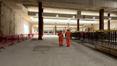Foreman-Taking-Engineer-Around-Worksite-At-Old-Oak-Common-In-London