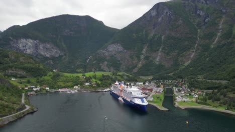 Cruise-Ship-in-Flam,-Norway---Sailing-through-the-Sognefjord-and-Aurlandsfjord---Aerial-Circling