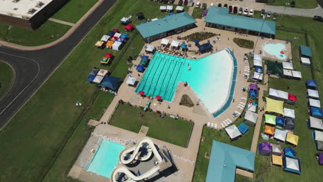 Tents-Around-Swimming-Pool-In-Aquatic-Center-During-Summer