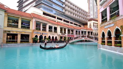 Located-in-Taguig-City,-Philippines,-this-popular-Venice-themed-commercial-complex-features-luxury-brand-stores,-international-food-bazaars,-gondola-rides-and-mimes,-for-a-memorable-experience