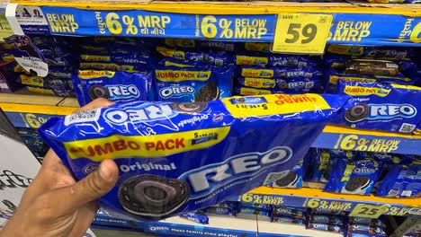 POV-shot,-people-buying-jumbo-packs-of-Colette-Oreo-Biscuits-from-a-supermarket