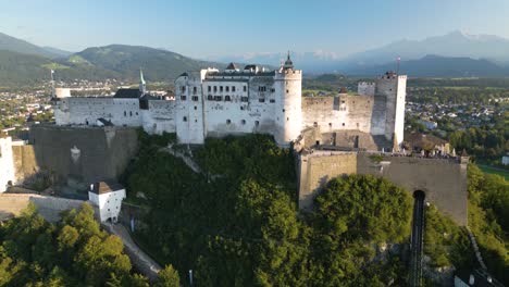 Cinematic-Drone-Shot-Over-Salzburg-Castle-on-Beautiful-Summer-Day-in-Austria