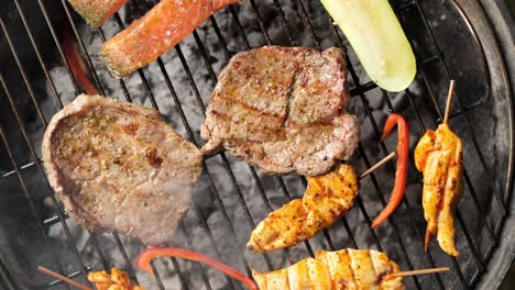 top-down-static-shot-of-the-grill-grate-with-chicken-steak-and-vegetables