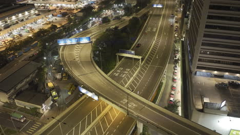 Aerial-HLG-drone-panining-shot-of-elevated-highway-network-in-Sai-Wan-between-urban-development