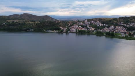 Greece,-Kastoria-Lake-and-Cityscape-in-the-Glorious-Light-of-Day:-An-Aerial-Adventure