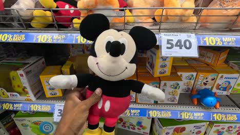 POV-shoot,-people-are-buying-mickey-mouse-from-super-market-to-gift-their-loved-ones