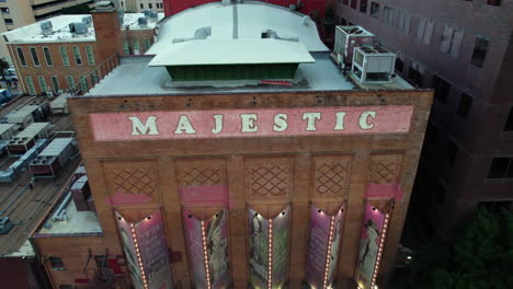 Aerial,-ascending,-tilt-shot-in-front-of-the-Majestic-theatre,-in-Dallas,-USA