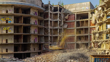 Demolition-timelapse-of-a-excavator-tearing-down-a-ramshackle-city-building