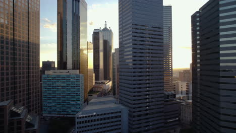 Aerial-view-flying-in-middle-of-skyscrapers-in-the-City-Center-District-of-Dallas