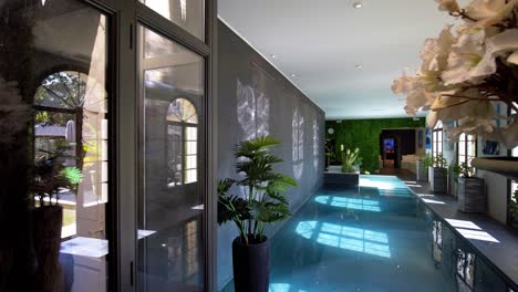 Slow-motion-shot-of-a-private-pool-inside-a-renovated-castle-in-the-south-of-France
