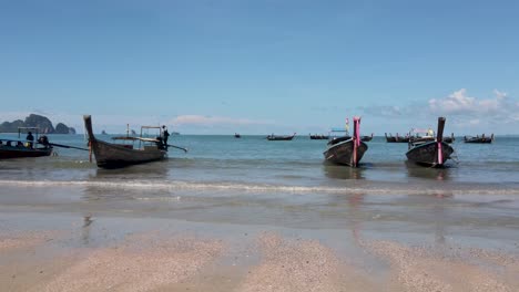 Longtail-boats-moored-at-Krabi,-Thailand