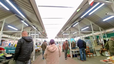 POV-looking-around-British-flea-market-at-variety-of-disposable-unwanted-tools-for-a-cheap-bargain