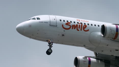 Thai-Smile-Airways-prepares-for-Landing-at-Suvarnabhumi-Airport,-Thailand