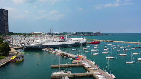 Aerial-view-over-the-MV-Abegweit-ferry,-docked-at-DuSable-Harbor-on-the-Lakefront-of-Chicago