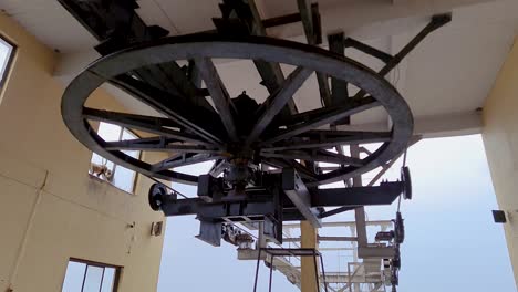 ropeway-revolving-electric-powered-wheel-at-ropeway-mountain-top-station-from-flat-angle-video-is-taken-at-pushkar-rajasthan-india-on-Aug-19-2023