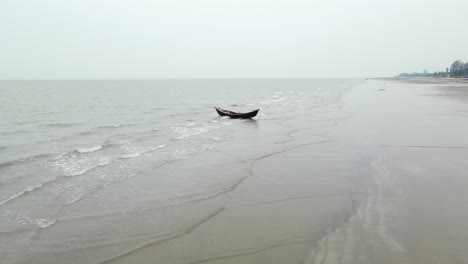 Indingenous-Fishing-Boat-On-Kuakata-Sea-Beach,-Bay-Of-Bengal,-Bangladesh