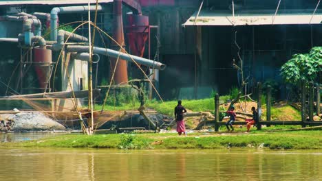 Kids-flying-kite-near-industrial-factory-while-toxic-gas-pollutes-environment