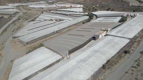 As-far-as-the-eye-can-see,-industrial-size-greenhouses-in-operation