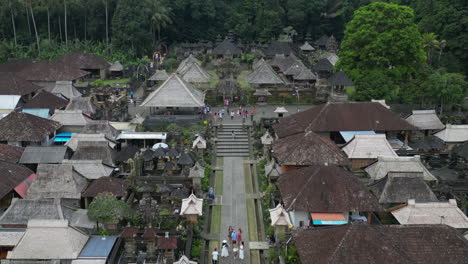 Aerial-view:-Temple-at-end-of-street-in-jungle-village,-Penglipuran