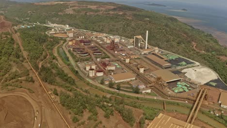 An-aerial-drone-shot-of-a-subsidiary-of-Sumitomo-corp-mining-factory-plant-at-Taganito-Claver,-Philippines