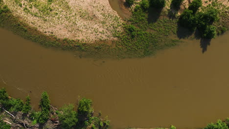 Brown-muddy-waters-of-the-Illinois-River-in-summer---Aerial
