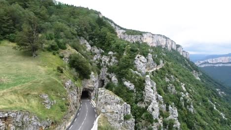 Beautiful-drone-shot-of-a-mountain-road-through-France