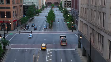Firetruck-driving-through-downtown-Chicago,-Illinois-city-streets