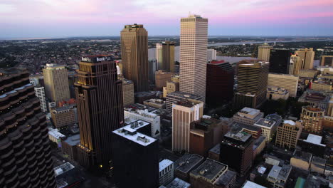 Aerial-view-flying-in-middle-of-high-rise-in-downtown-New-Orleans,-Louisiana,-USA