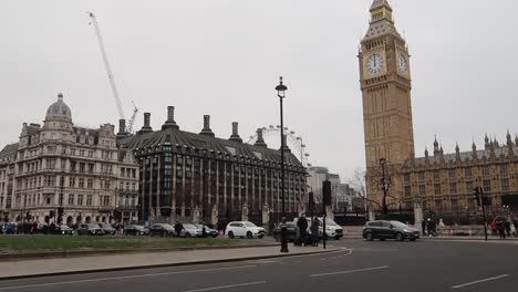 Parliament-Street-Traffic-in-London-city-center-with-Big-Ben-and-pedestrian-people-in-westminster