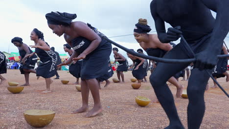Gbagyi-tribal-festival-in-Kubwa,-Nigeria---slow-motion-hunt-and-dance