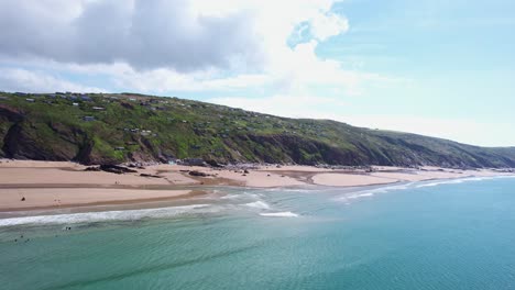 Whitsand-Bay-Beach-Along-Cornish-Coastline-Cliffs-and-Landscape,-Aerial-Drone-Shot