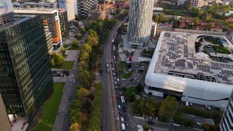 Slow-Cinematic-Reveal-Of-Bucharest-Business-District-at-Sunset---A-Bird's-Eye-View