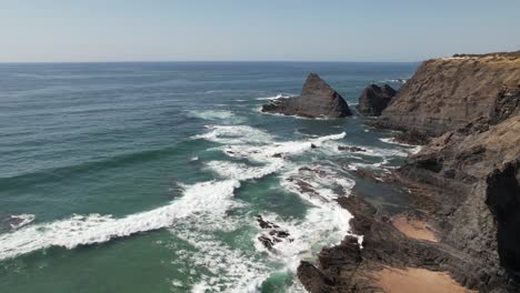 Summer-Day-At-Beautiful-Beach-With-Cliffs-In-Costa-Vicentina,-Alentejo,-Portugal