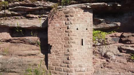 Drone-Video-of-the-Meistersel-Castle-Ruin-on-Top-of-a-Hill-in-the-Palatinate-Forest-on-a-Beautiful-Sunny-Day