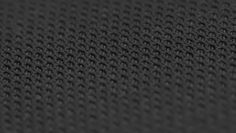Extremely-Detailed-Close-up-Moving-Macro-Shot-of-Black-Nylon-Fabric