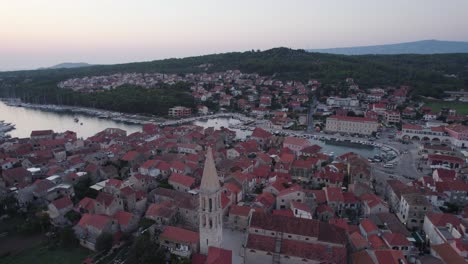 Aerial:-Stari-Grad,-Hvar--Picturesque-harbor-view-with-a-blend-of-nature-and-architecture