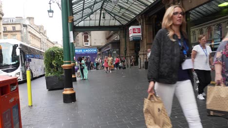 People-walking-past-Glasgow-Central-station-heading-to-unknown-destinations