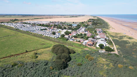 Aerial-video-footage-highlights-the-natural-charm-of-Anderby-Creek,-a-serene-and-unspoiled-beach-in-the-town-of-Anderby-on-the-Lincolnshire-coast